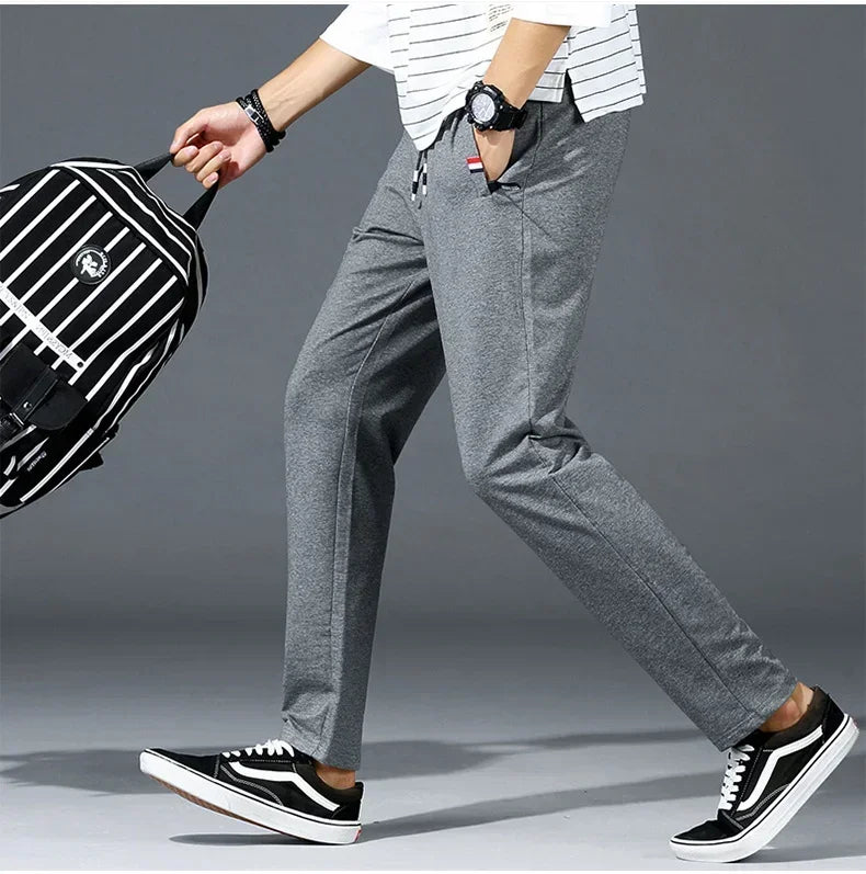 Spring Pants Men Fitness Sportswear Tracksuit Elastic Waist Sweatpants Cotton Trousers Loose Gyms Jogger Track Pants Mens M- 8XL